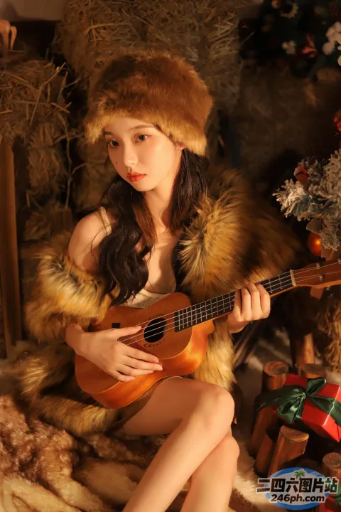 戴着毛皮帽的阿拉夫德女人弹奏尤克里塔